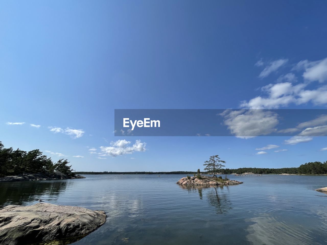 VIEW OF LAKE AGAINST SKY