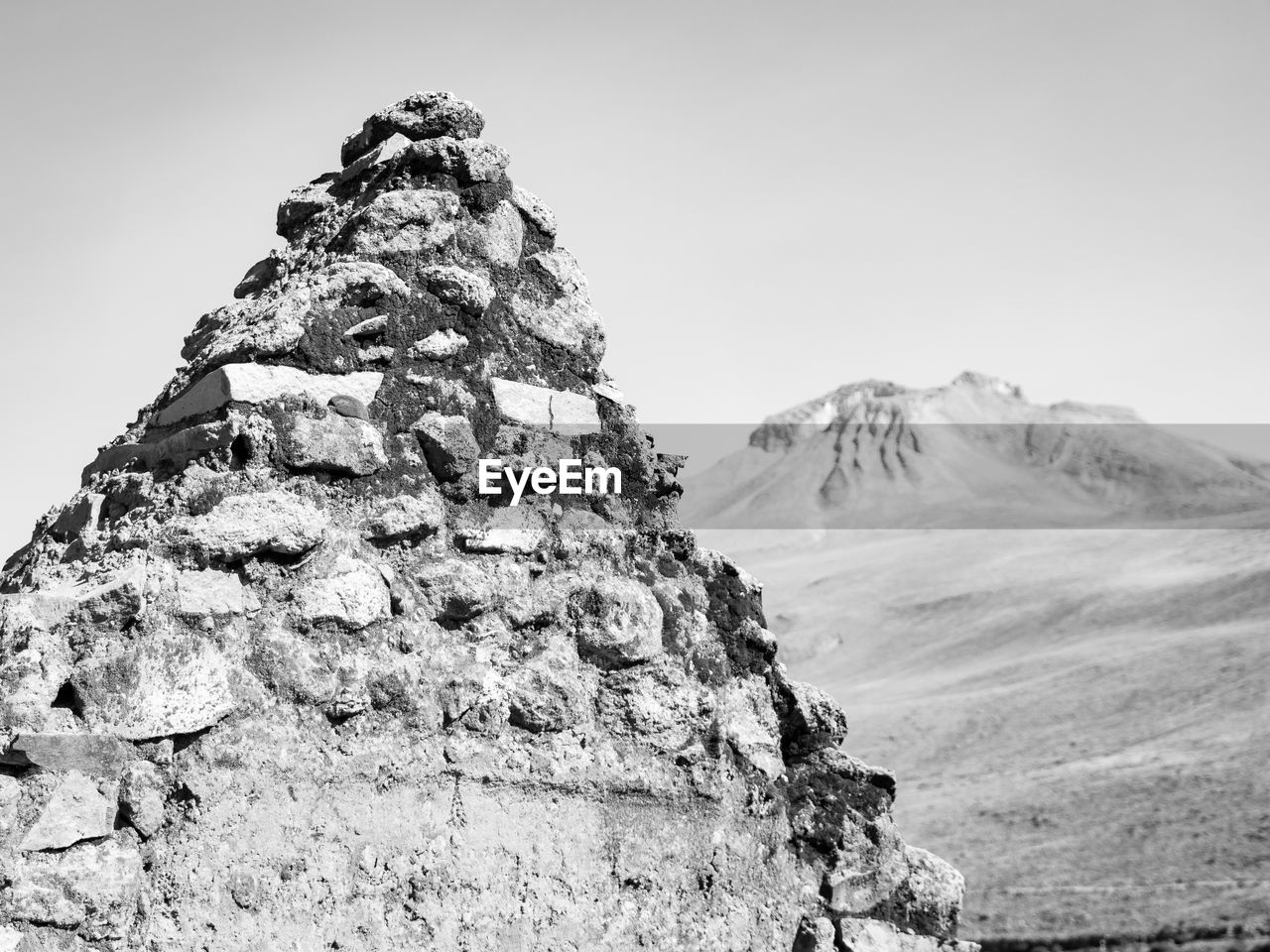 LOW ANGLE VIEW OF ROCK FORMATIONS AGAINST SKY