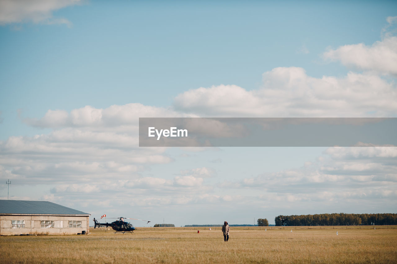 AGRICULTURAL FIELD AGAINST SKY