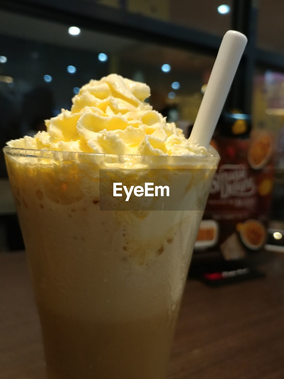 CLOSE-UP OF ICE CREAM WITH DRINK