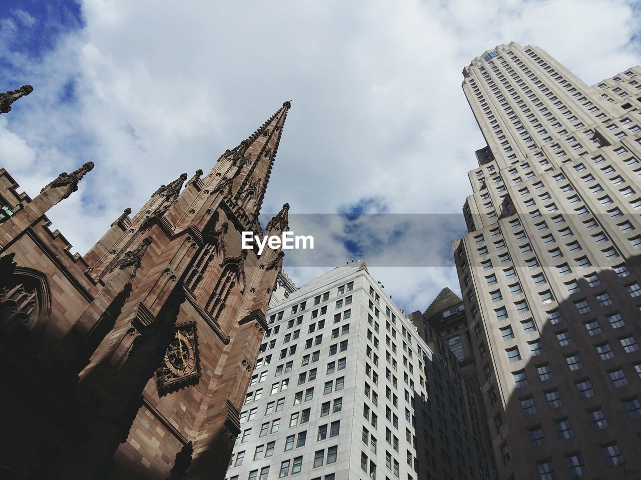 Low angle view of skyscrapers against sky