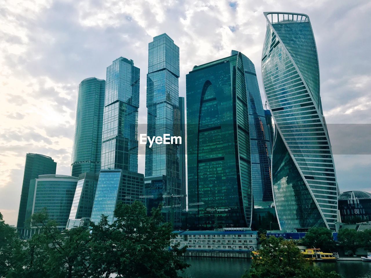 Low angle view of modern buildings against sky