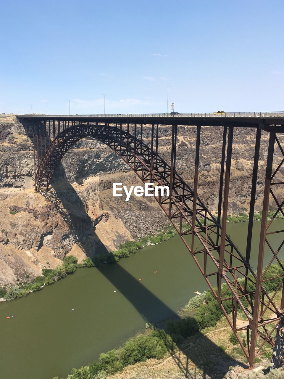 Bridge over river against sky