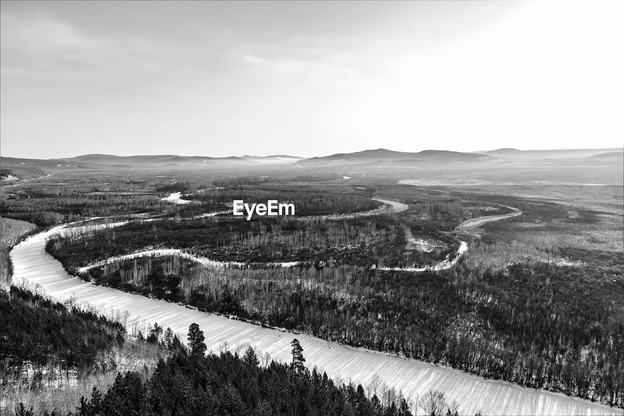 black and white, landscape, environment, scenics - nature, monochrome photography, plant, sky, nature, monochrome, beauty in nature, tranquil scene, land, tranquility, mountain, day, tree, non-urban scene, no people, cloud, high angle view, transfer print, rural scene, auto post production filter, outdoors, road, field, aerial photography, snow, transportation, grass, travel, idyllic