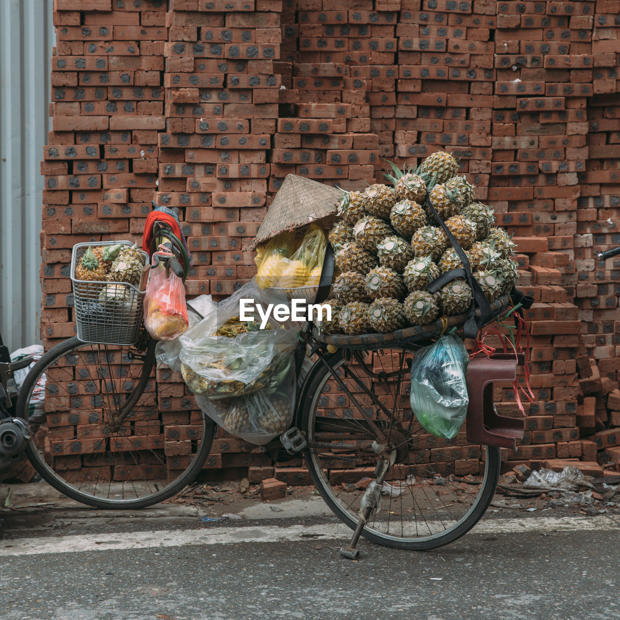 BICYCLE ON BRICK WALL