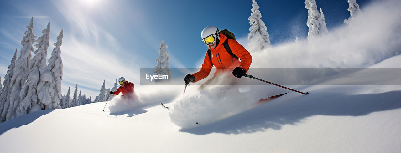 low angle view of woman skiing on snow covered field