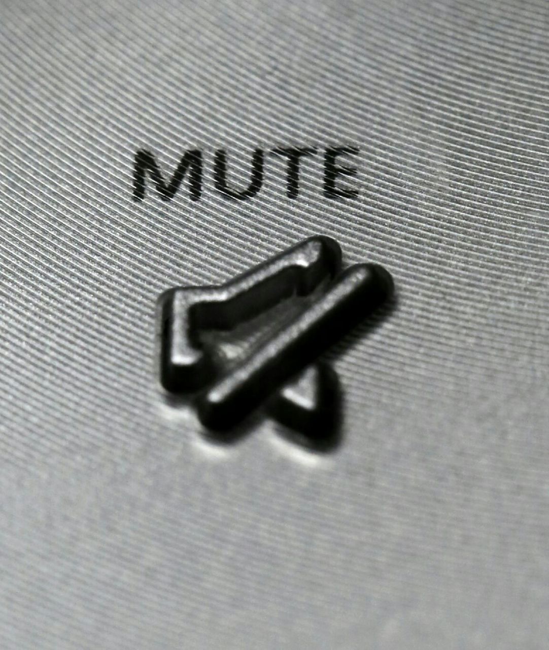 Close-up of mute sign