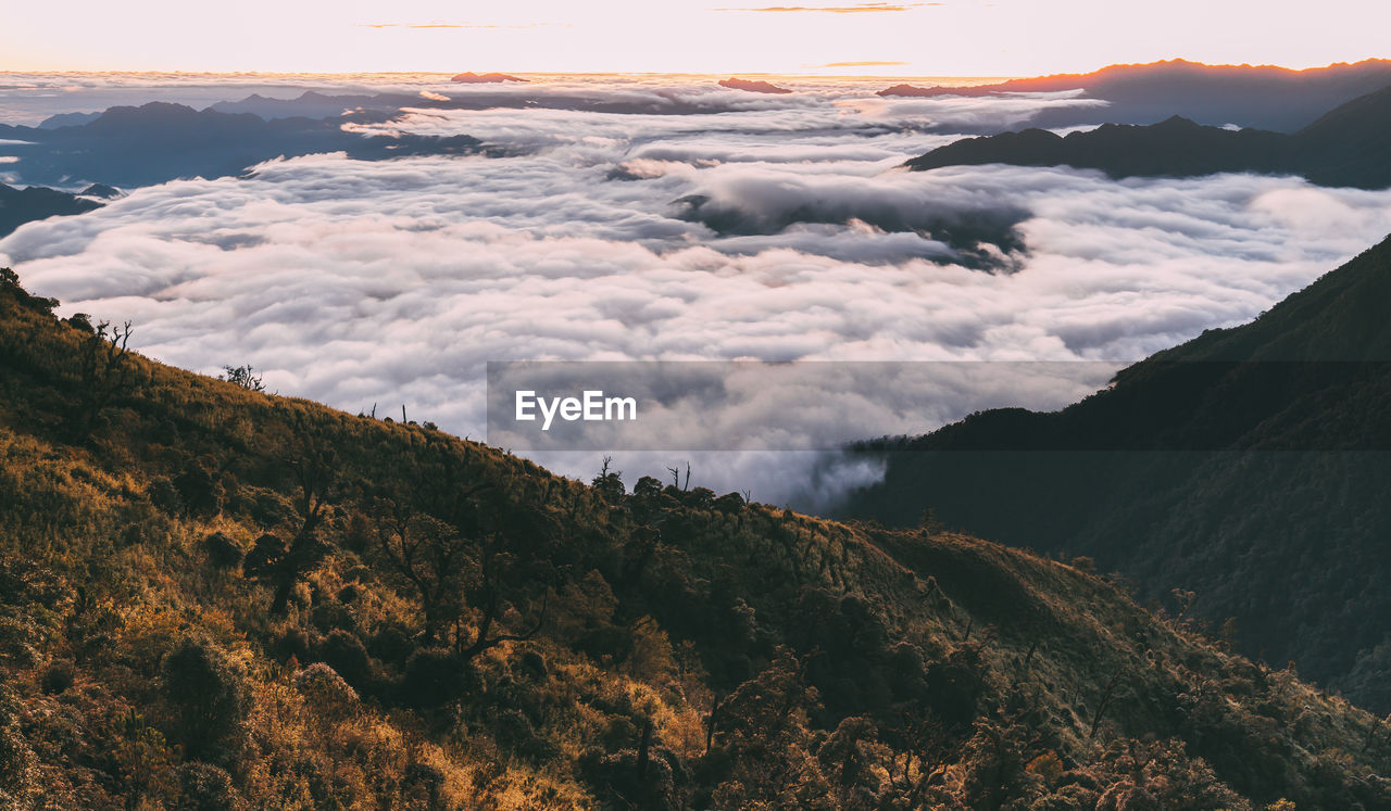 High angle view of mountains against sky during sunset