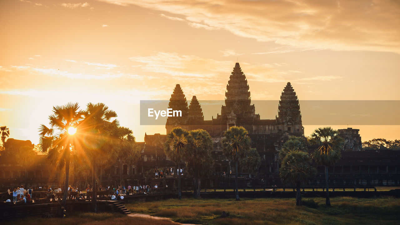 VIEW OF BUILDINGS AT SUNSET