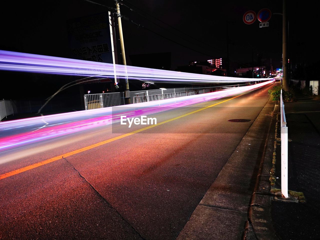 light trail, transportation, long exposure, night, illuminated, road, motion, speed, city, street, light, architecture, blurred motion, traffic, mode of transportation, darkness, tail light, no people, built structure, highway, city life, evening, lane, street light, lighting equipment, motor vehicle, light - natural phenomenon, city street, outdoors, lighting, building exterior, car, sign, the way forward, on the move, headlight, travel, nature