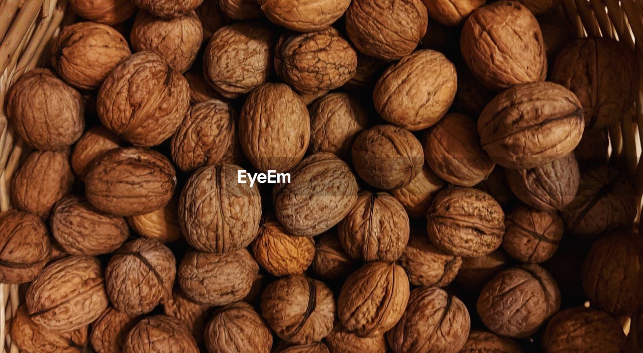 food and drink, food, large group of objects, nuts & seeds, nut - food, nut, brown, produce, walnut, close-up, freshness, no people, indoors, abundance, wellbeing, backgrounds, still life, healthy eating, full frame, almond, pattern, textured