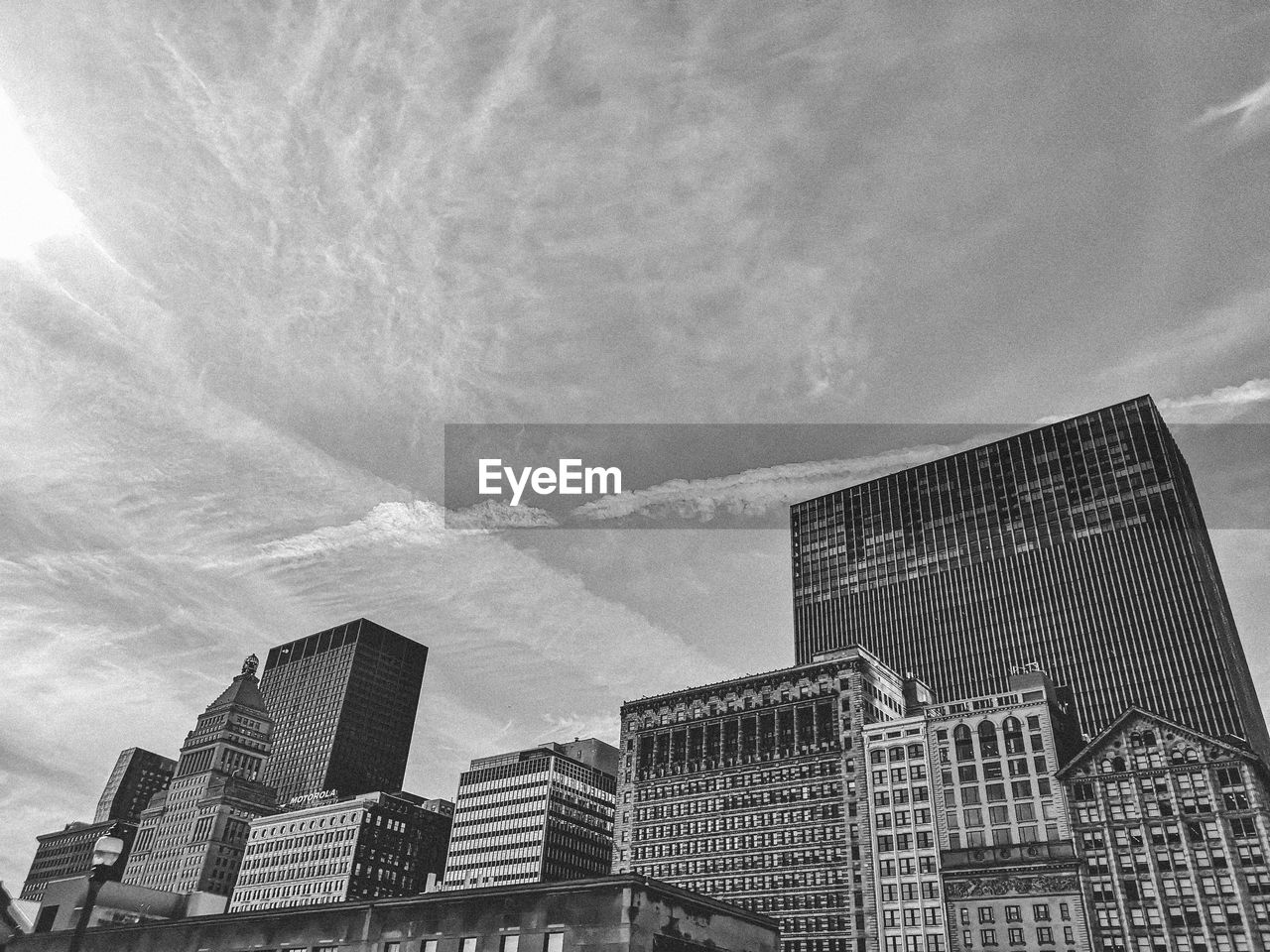 Low angle view of buildings against sky in city