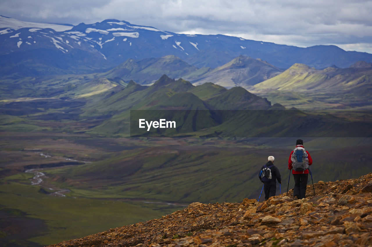 Hiker descending into a valley on the laugavegur trek