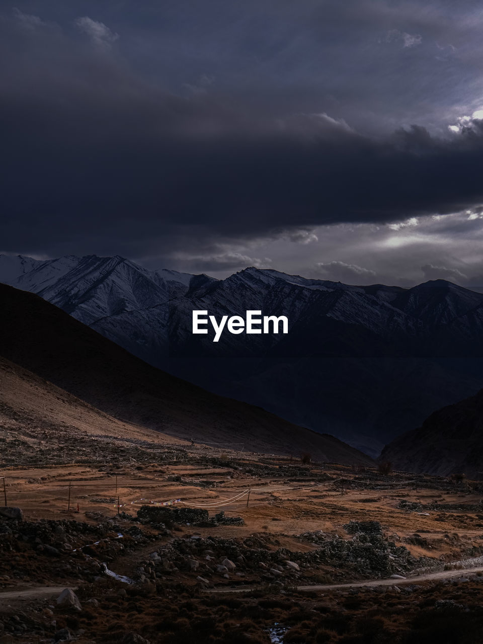 Scenic view of mountains against sky during dusk
