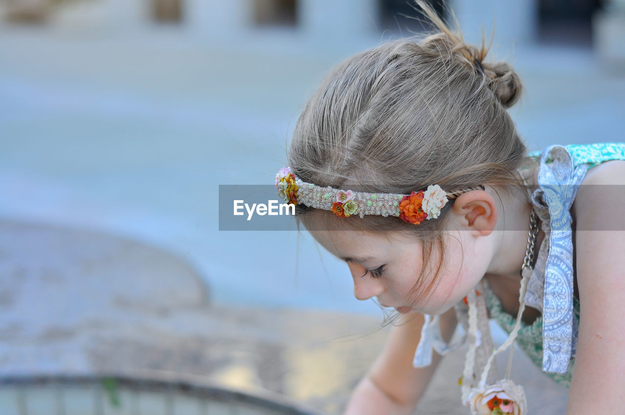 Close-up of girl wearing headband