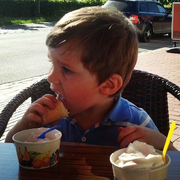 Cute boy eating ice cream