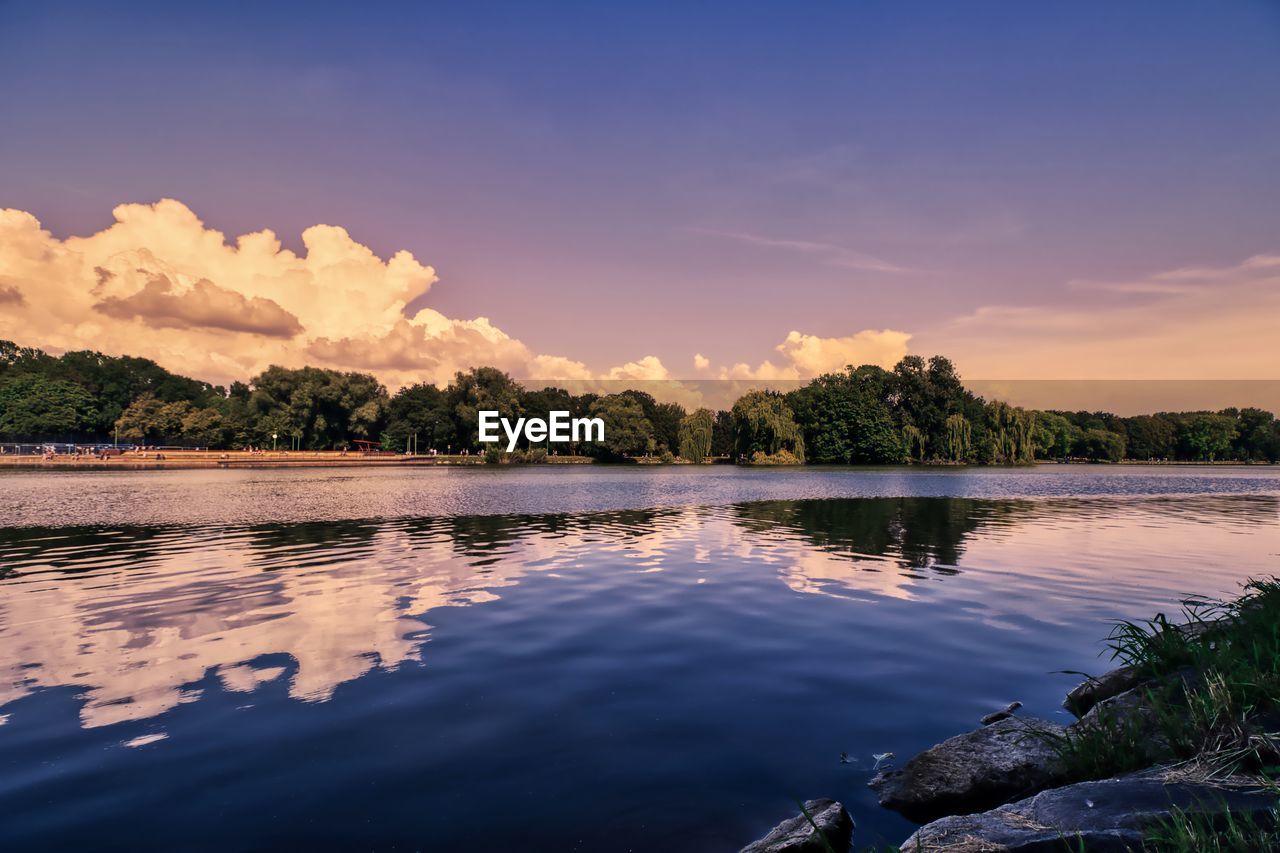 Scenic view of lake against sky during sunset