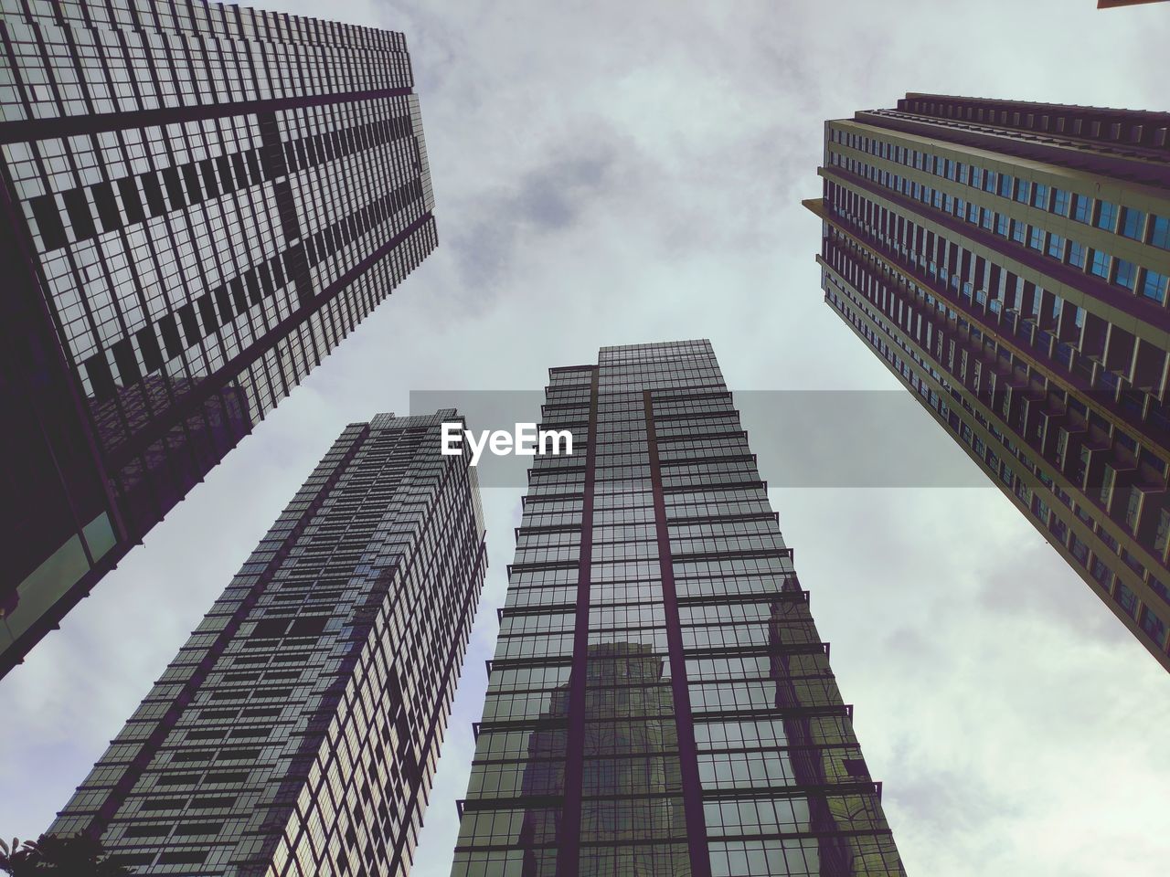 Low angle view of modern buildings against sky