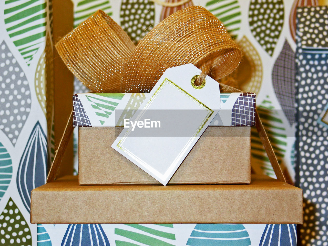 Close-up of stacked gifts on table