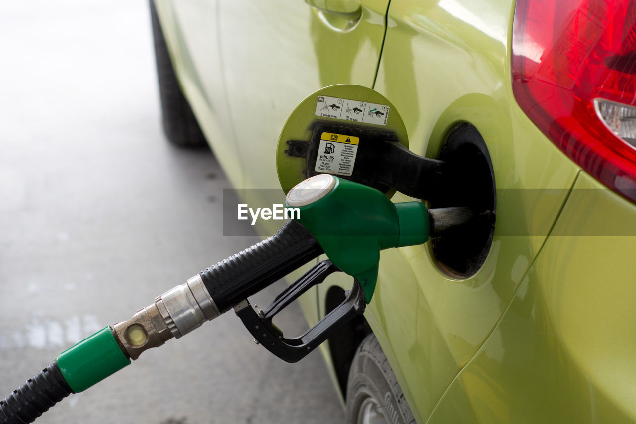 Close-up of car filling up gasoline