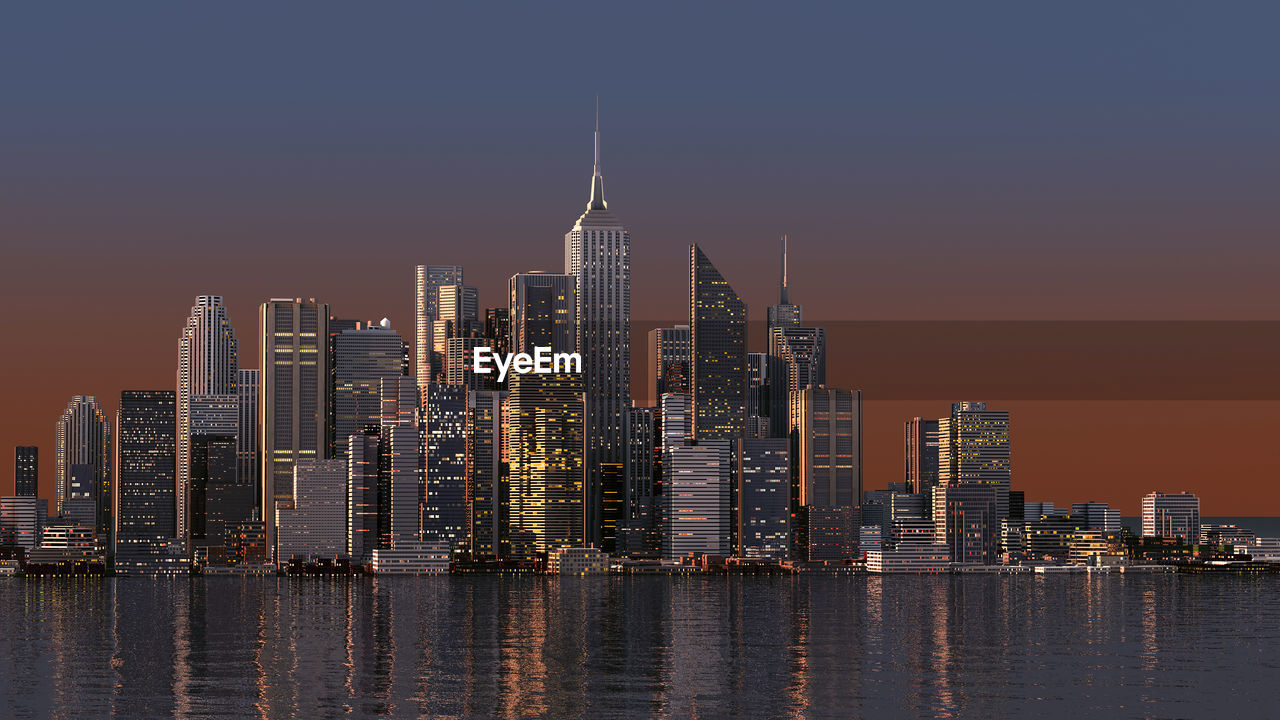 Illuminated buildings in city against sky