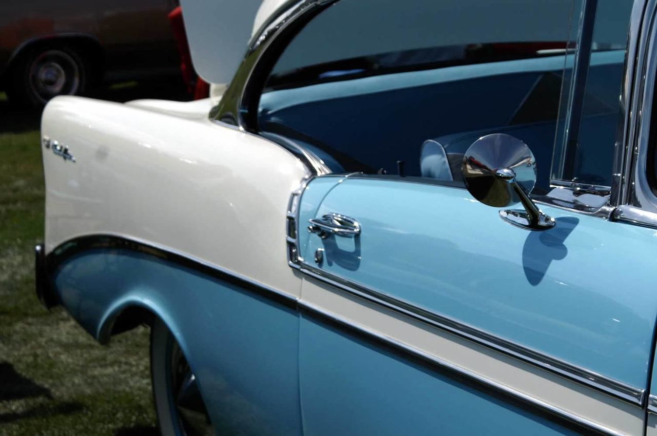 CLOSE-UP OF CAR HEADLIGHT