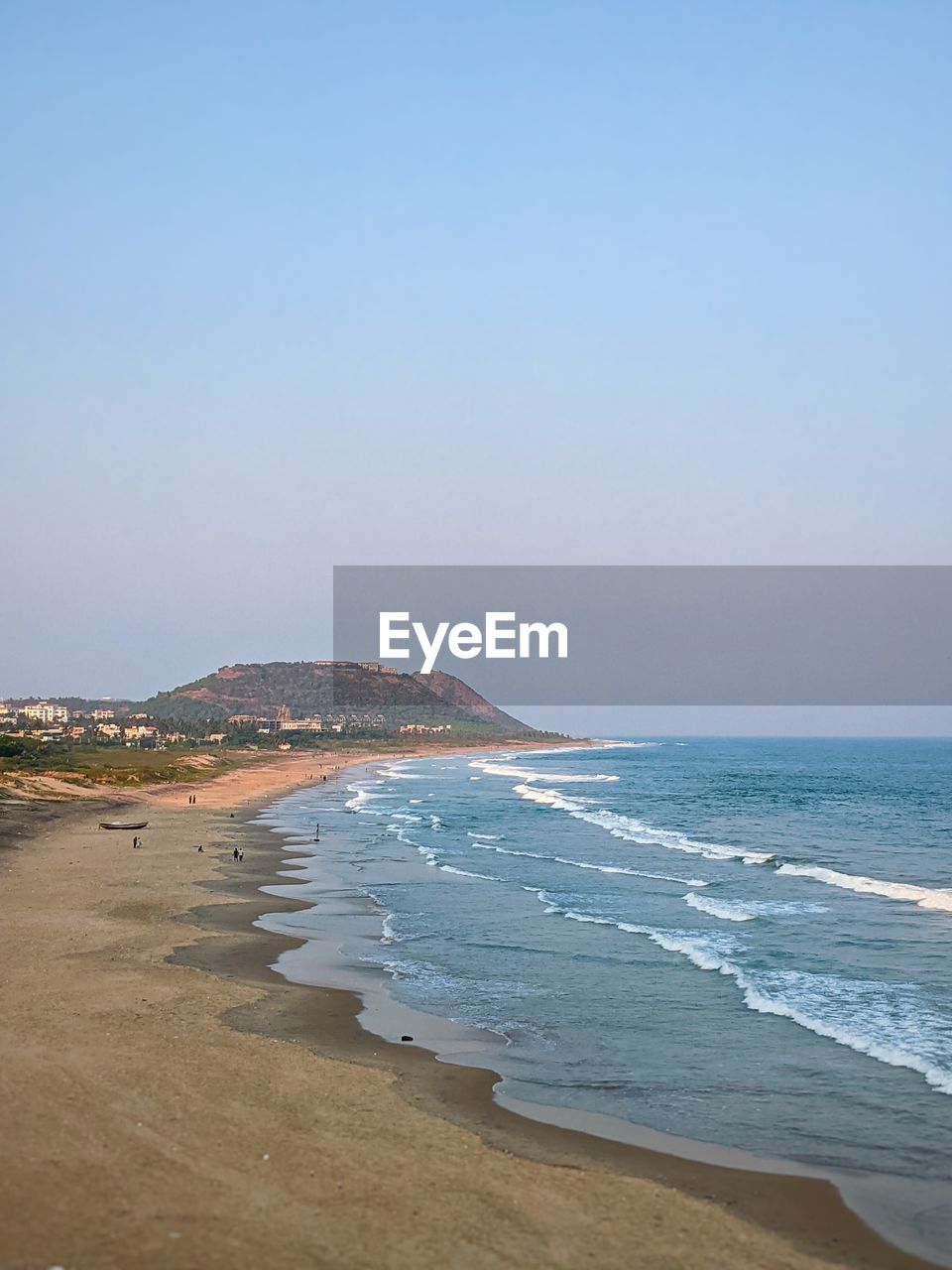 VIEW OF BEACH AGAINST CLEAR SKY