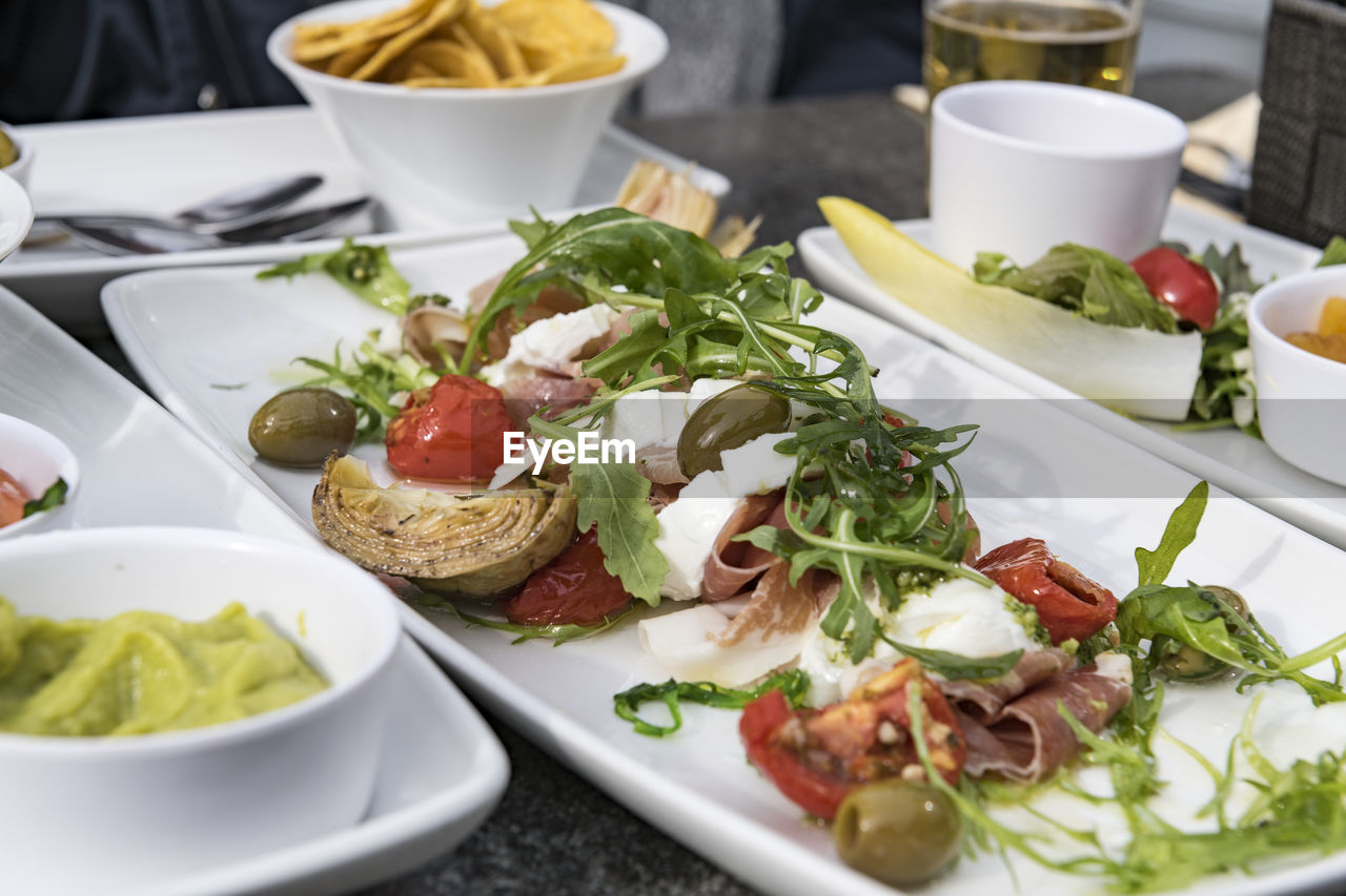 CLOSE-UP OF BREAKFAST SERVED ON TABLE