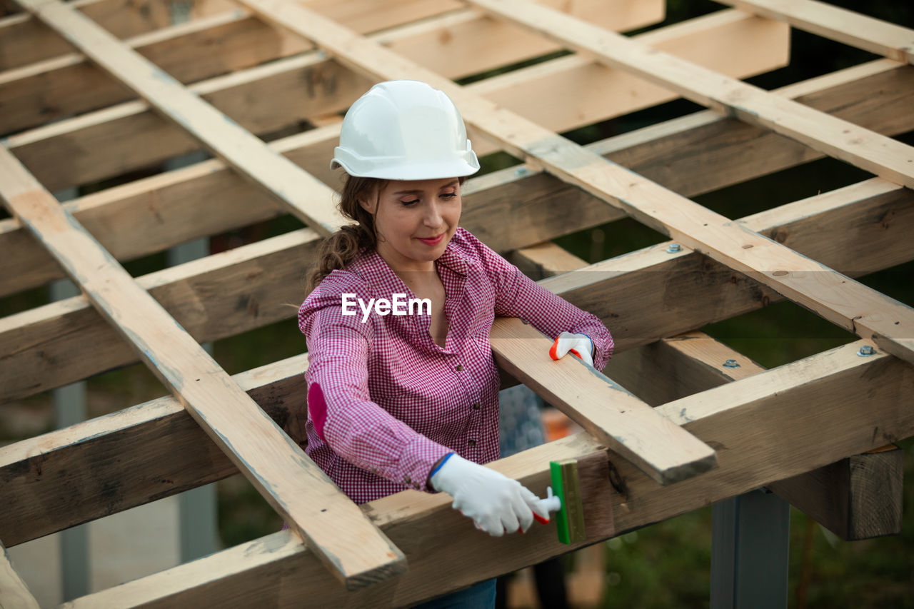 Portrait of girl standing on wood