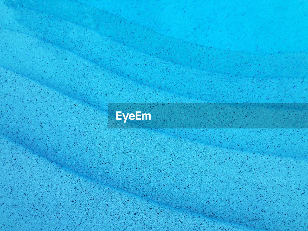 Full frame shot of blue water in a swimming pool