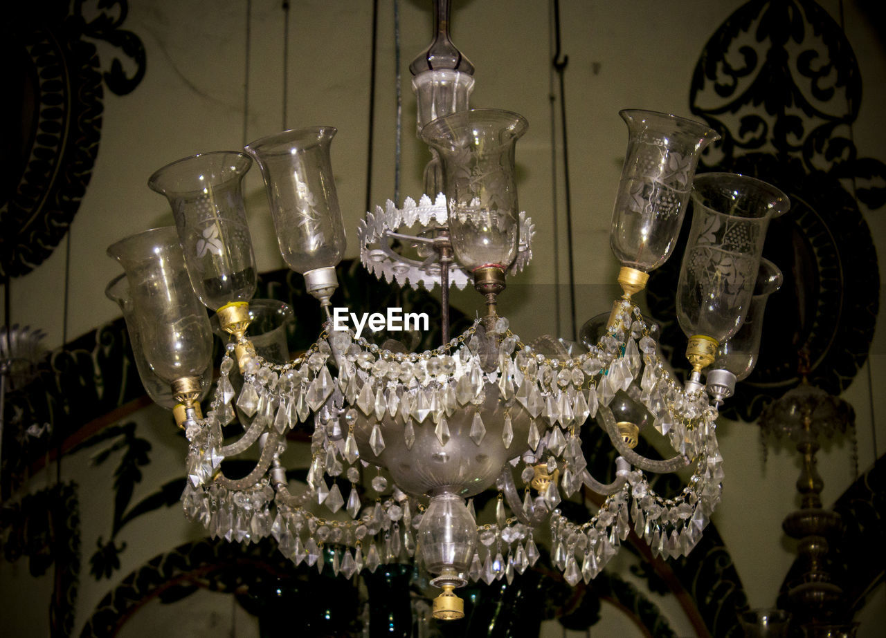 CLOSE-UP OF ILLUMINATED CHANDELIER