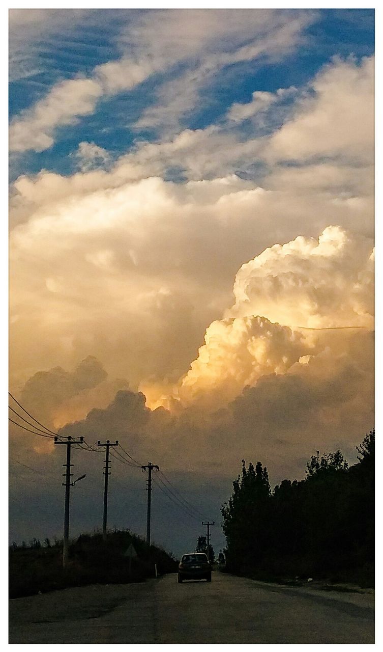 SCENIC VIEW OF LANDSCAPE AGAINST CLOUDY SKY