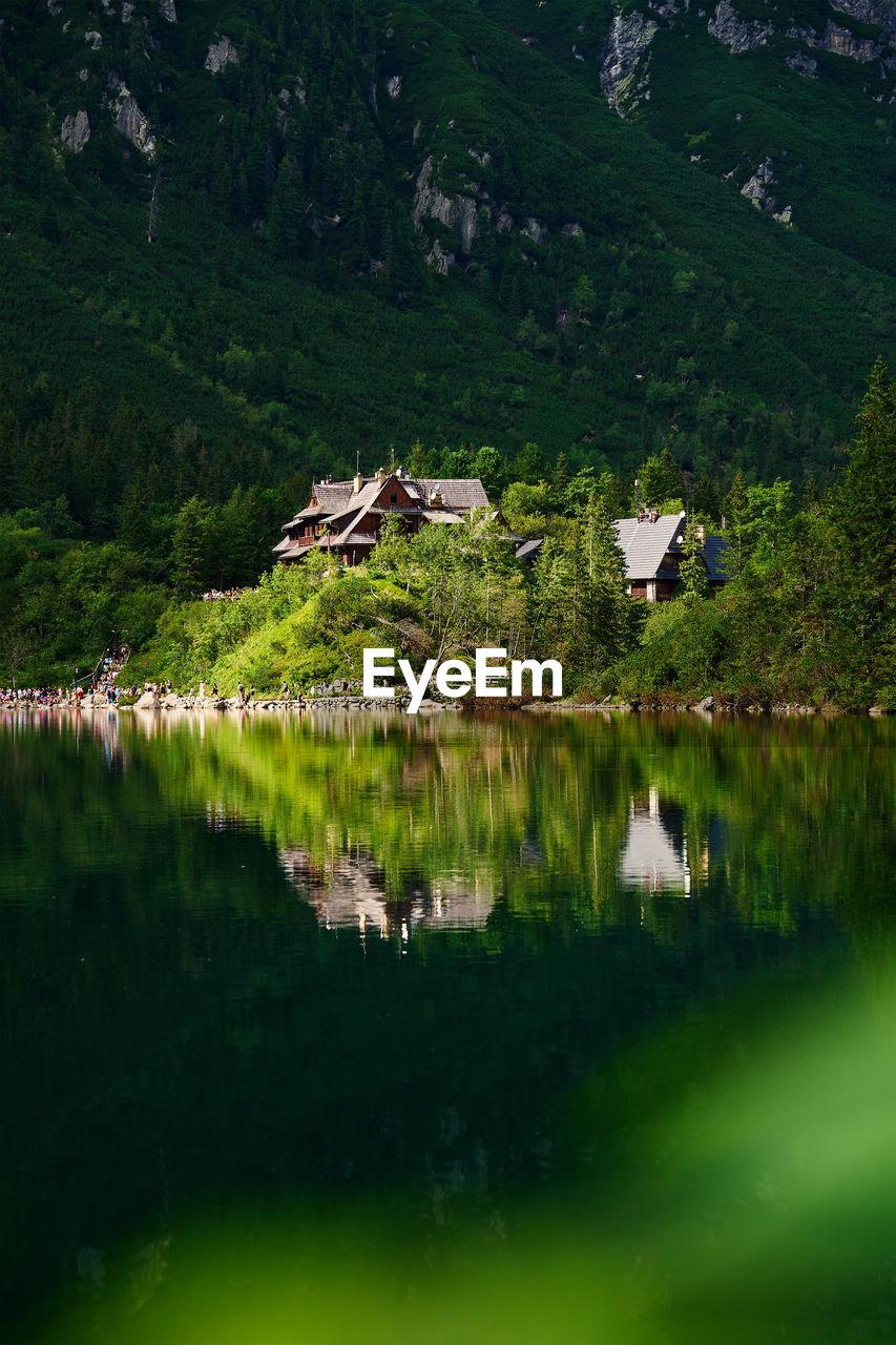 Mountains range near beautiful lake. tatra national park in poland. morskie oko or sea eye lake