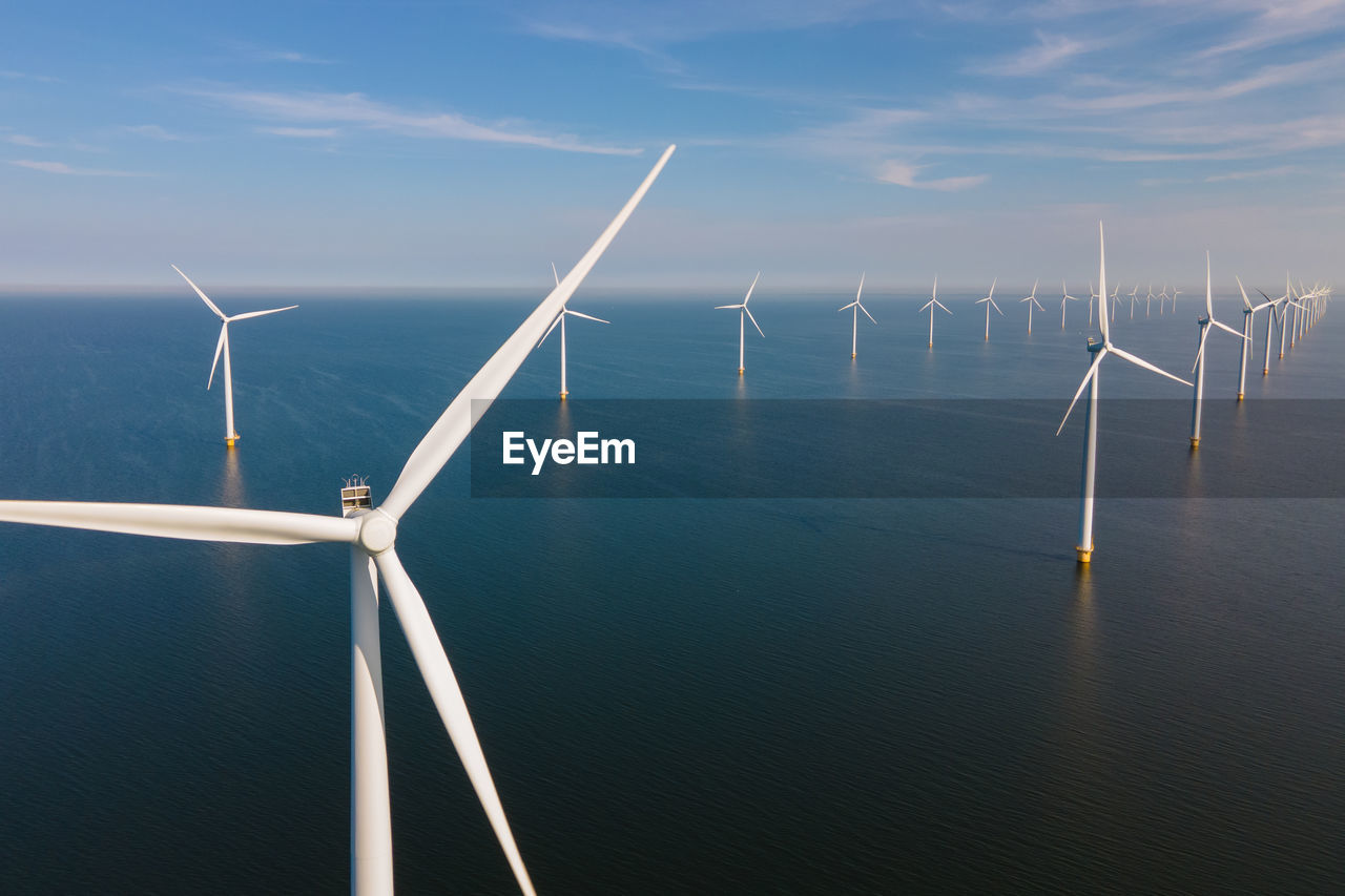 low angle view of wind turbine against sky