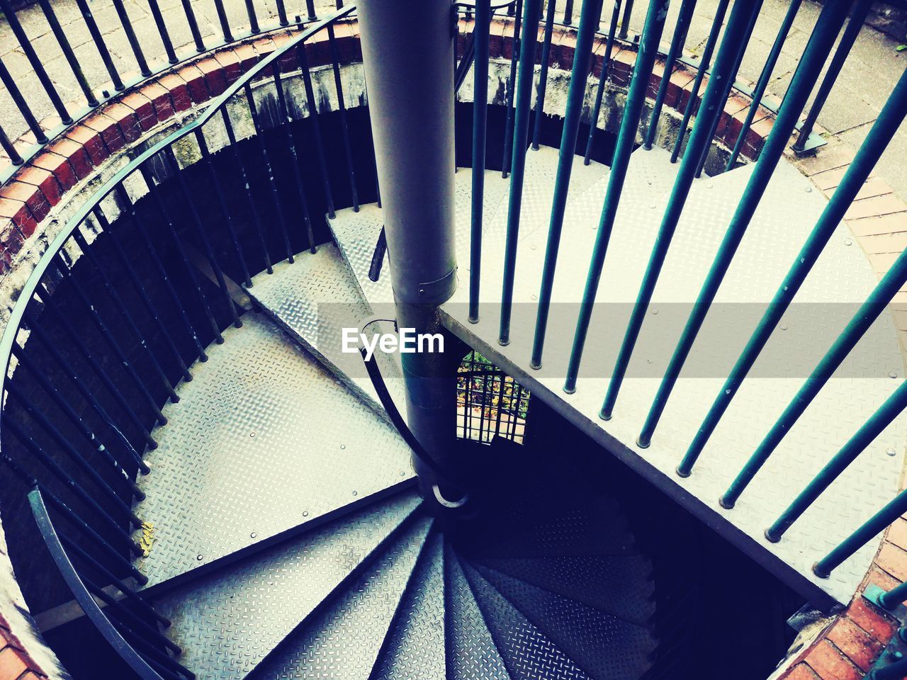 HIGH ANGLE VIEW OF SPIRAL STAIRCASE