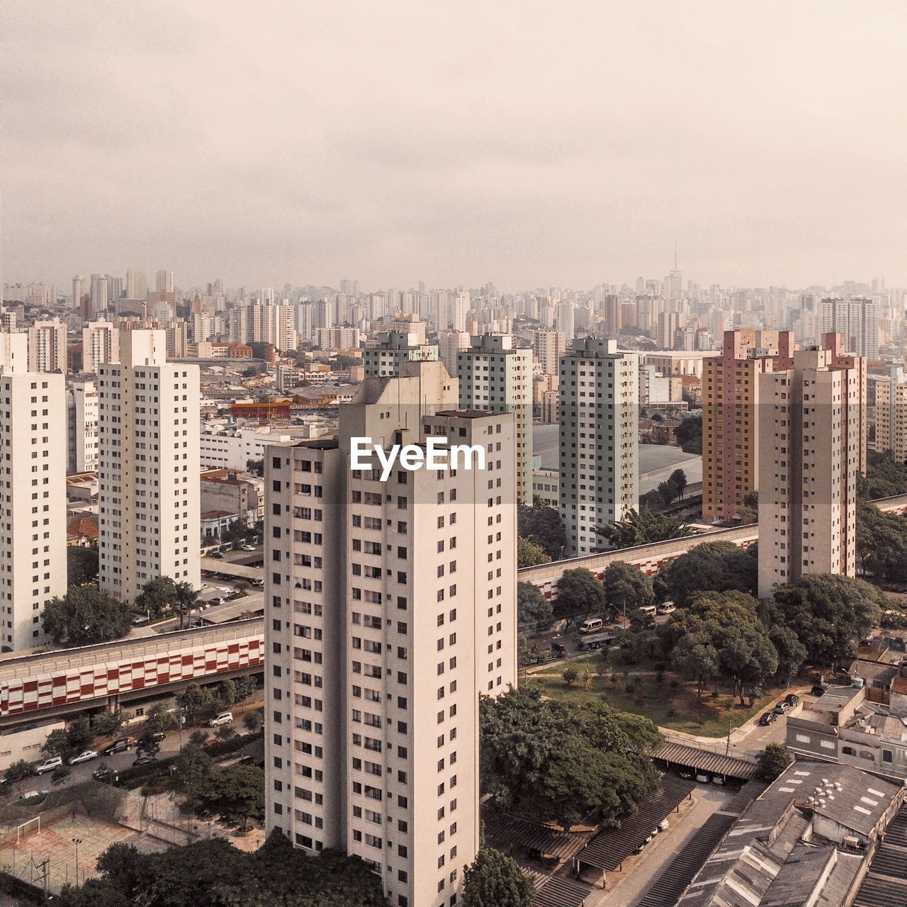 High angle view of buildings in city against sky