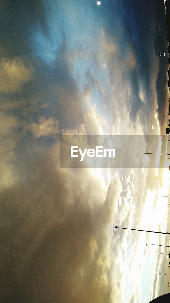 LOW ANGLE VIEW OF CLOUDY SKY DURING WINTER