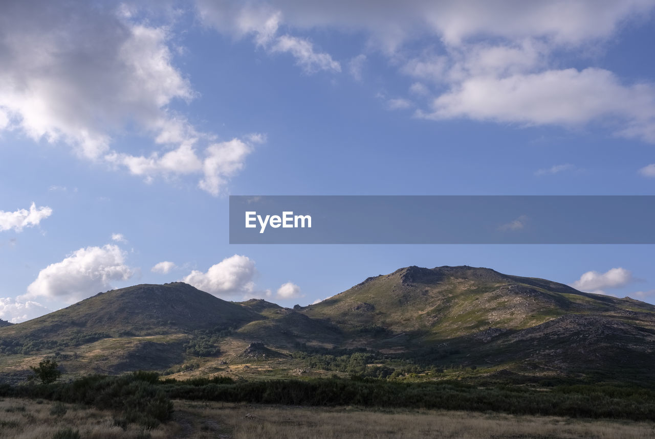 mountain, sky, cloud, environment, landscape, scenics - nature, nature, beauty in nature, lake, highland, mountain range, land, no people, travel destinations, non-urban scene, travel, tranquility, outdoors, day, tranquil scene, plant, tourism, wilderness, volcano, plateau