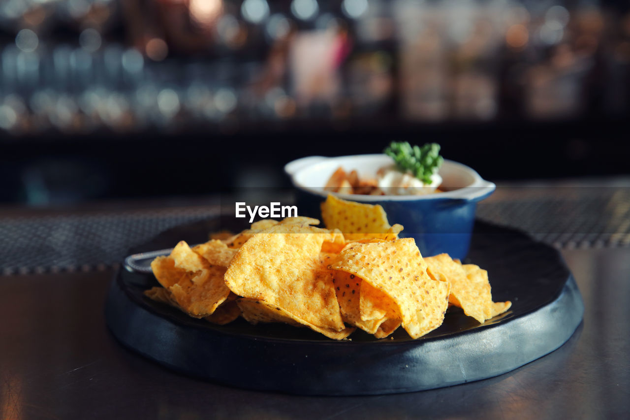 CLOSE-UP OF SERVED FOOD ON TABLE