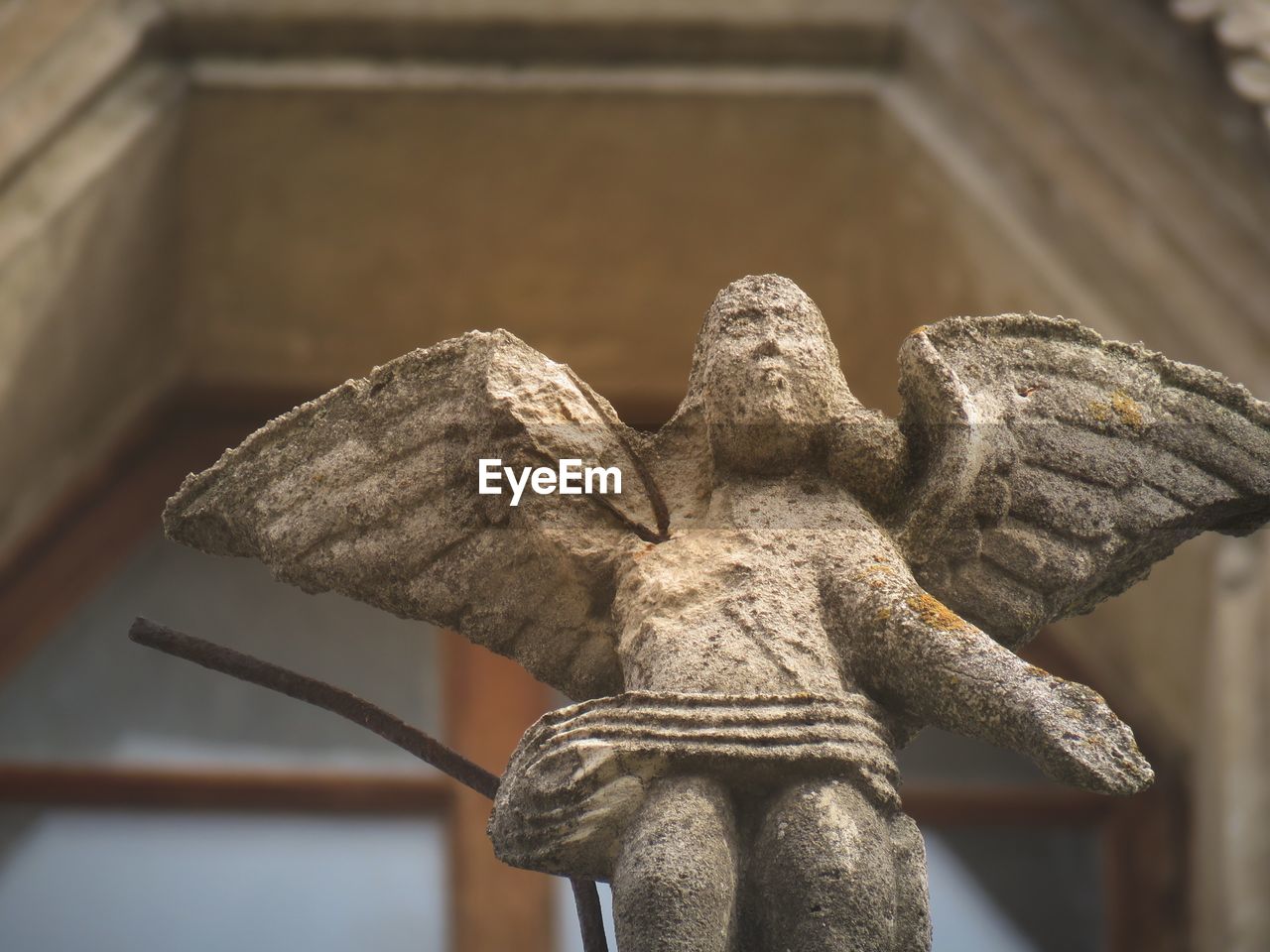 Close-up of angel statue in cemetery