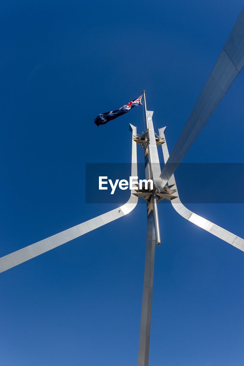 LOW ANGLE VIEW OF WINDMILL AGAINST SKY