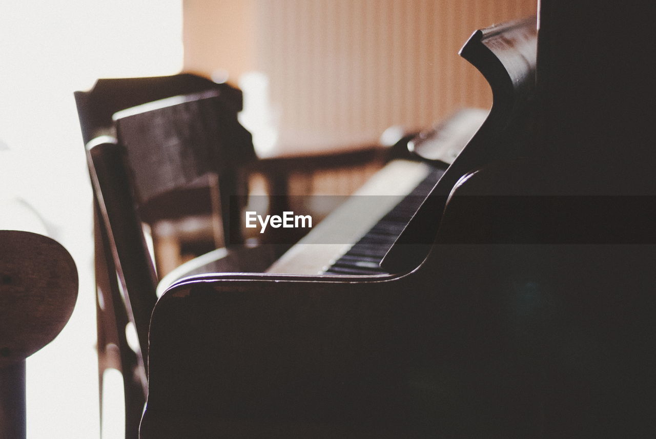 Close-up of piano on table