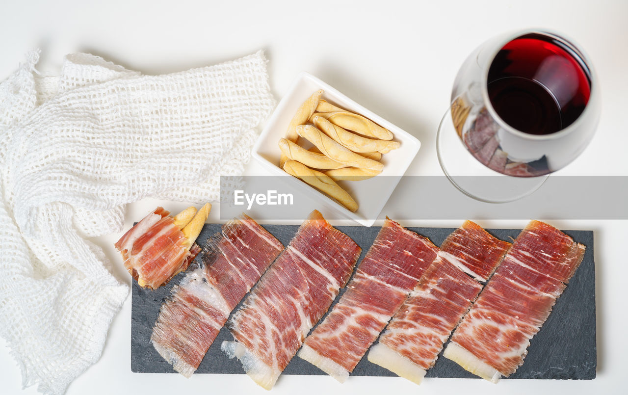 HIGH ANGLE VIEW OF BREAKFAST AND COFFEE ON TABLE