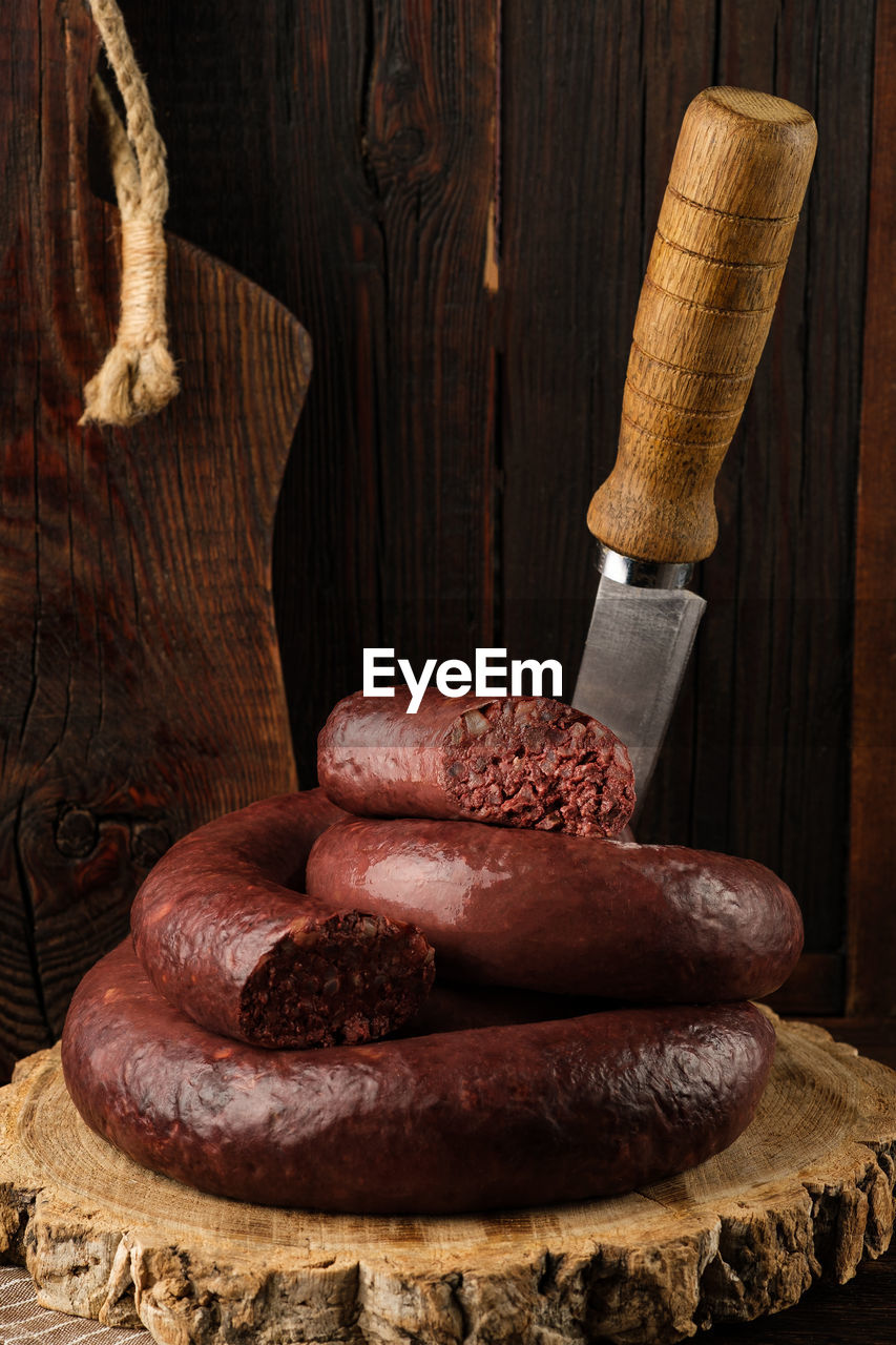 high angle view of mortar and pestle on wooden wall