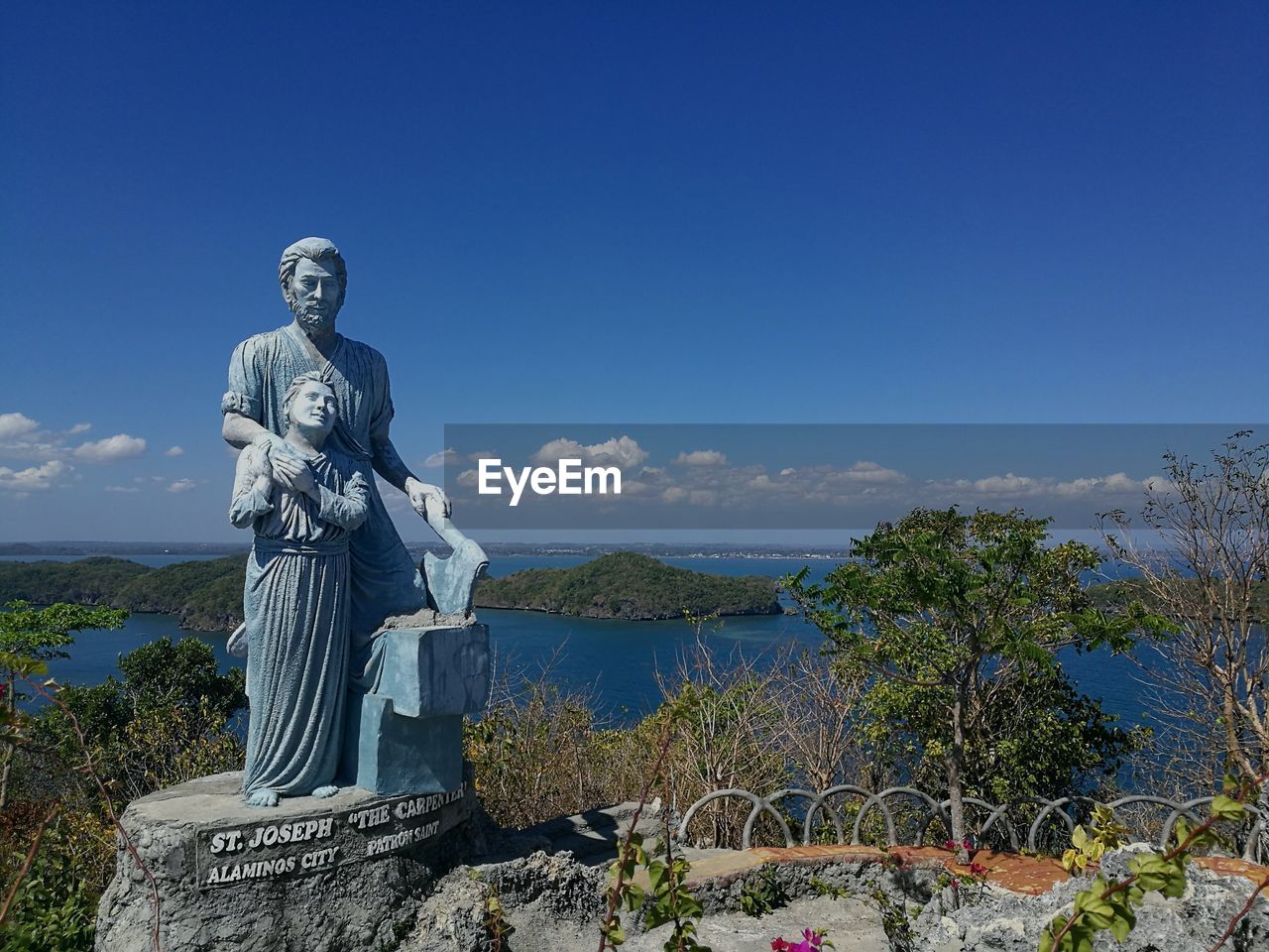 STATUE AGAINST SKY