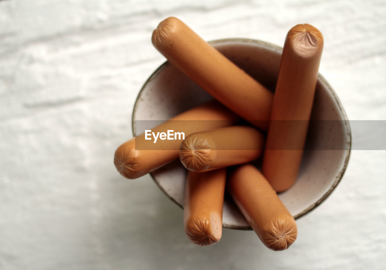 High angle view of sausages in container