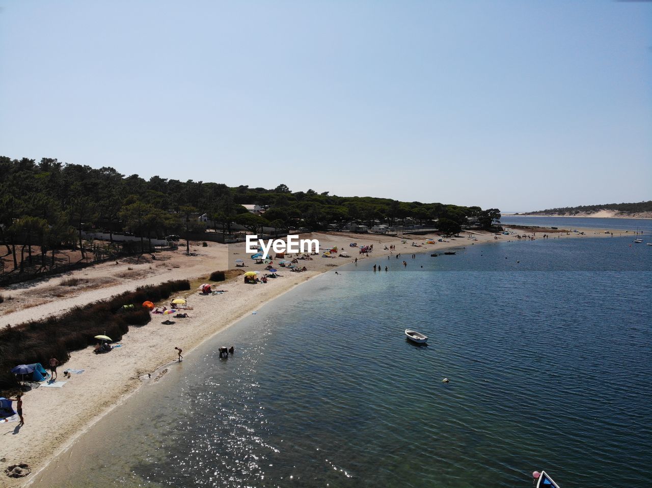 HIGH ANGLE VIEW OF BEACH AGAINST SKY