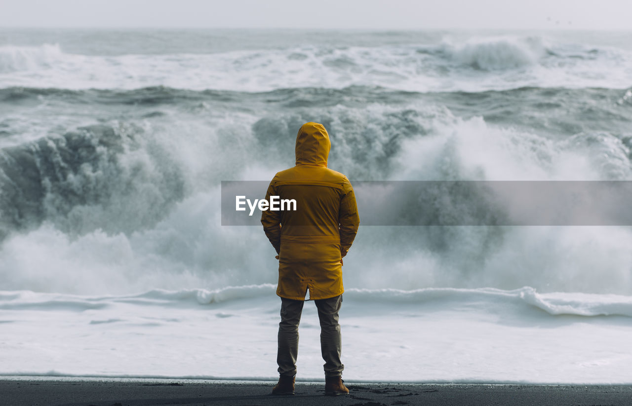 Man standing at beach