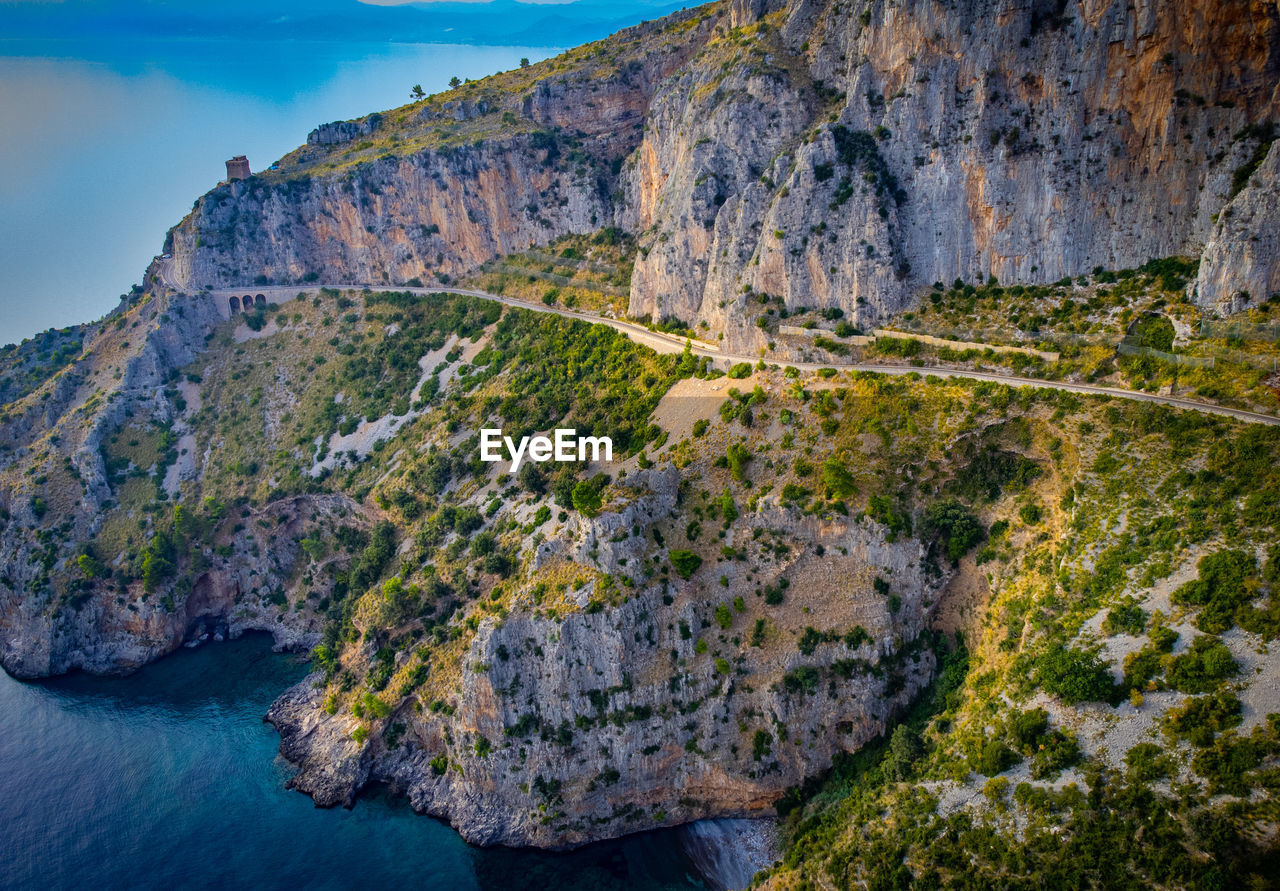 scenic view of sea and mountains