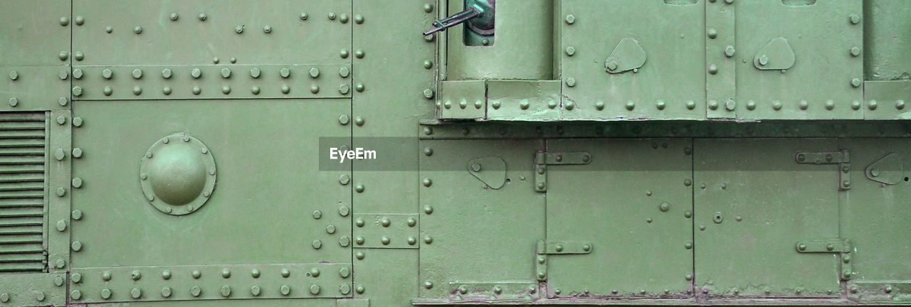 FULL FRAME SHOT OF CLOSED DOOR OF OLD TRAIN